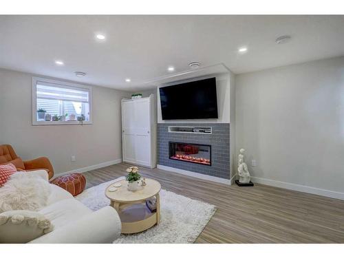 123 Huntchester Crescent Ne, Calgary, AB - Indoor With Fireplace