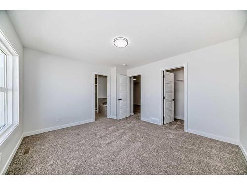 44 Carringvue Passage Nw, Calgary, AB - Indoor Photo Showing Other Room