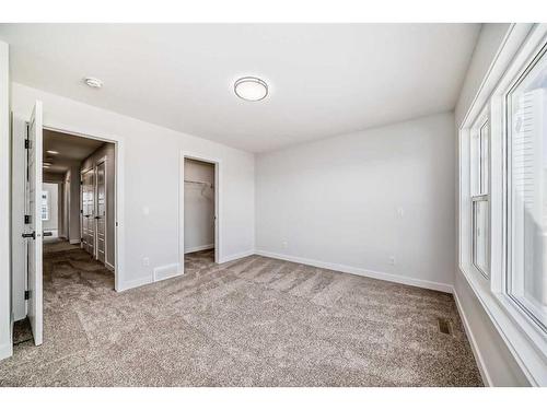 44 Carringvue Passage Nw, Calgary, AB - Indoor Photo Showing Other Room