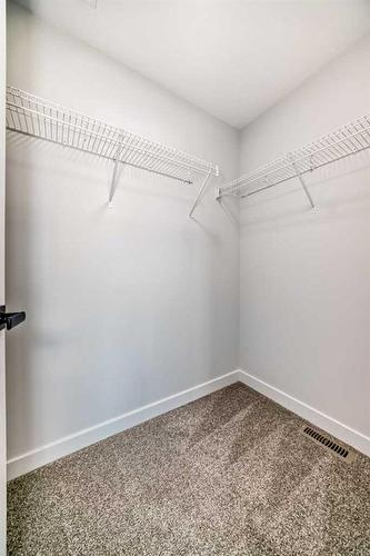 44 Carringvue Passage Nw, Calgary, AB - Indoor With Storage