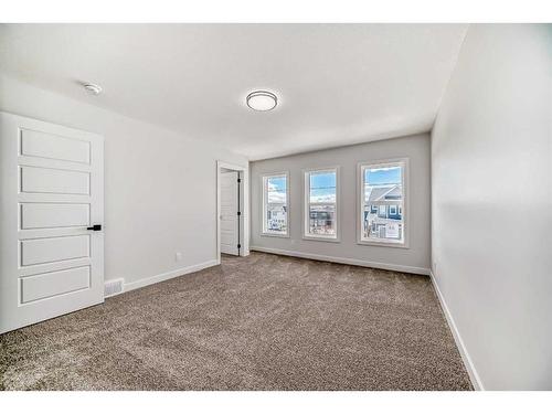 44 Carringvue Passage Nw, Calgary, AB - Indoor Photo Showing Other Room