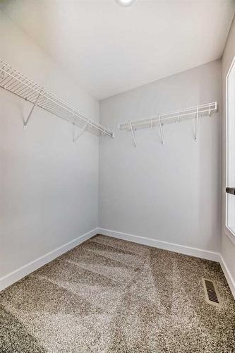 44 Carringvue Passage Nw, Calgary, AB - Indoor With Storage