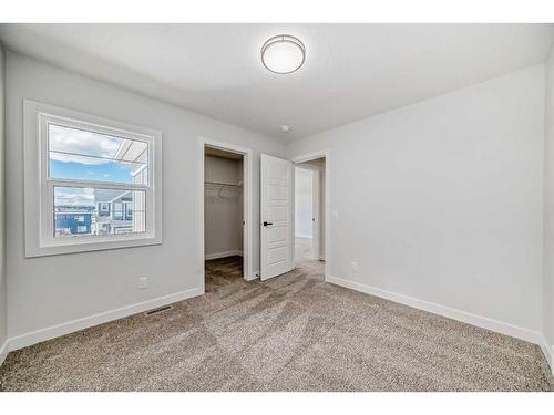 44 Carringvue Passage Nw, Calgary, AB - Indoor Photo Showing Other Room