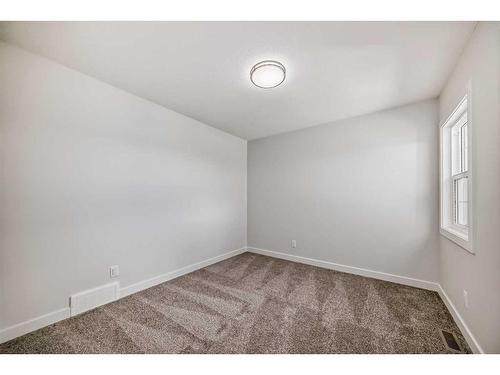 44 Carringvue Passage Nw, Calgary, AB - Indoor Photo Showing Other Room