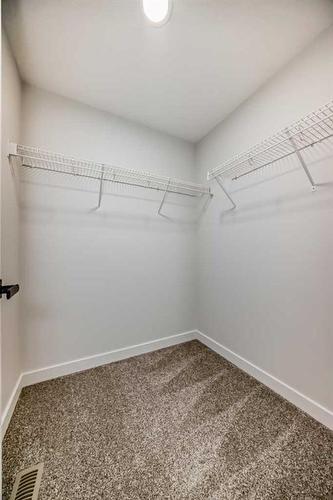 44 Carringvue Passage Nw, Calgary, AB - Indoor With Storage