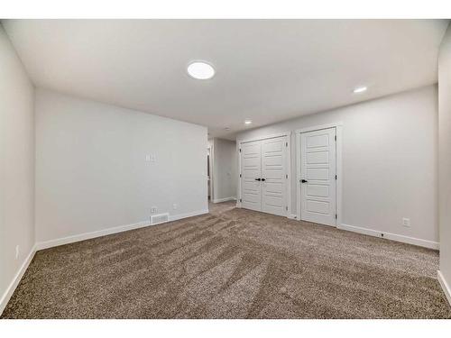 44 Carringvue Passage Nw, Calgary, AB - Indoor Photo Showing Other Room