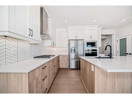 44 Carringvue Passage Nw, Calgary, AB - Indoor Photo Showing Kitchen With Upgraded Kitchen