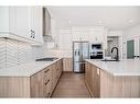 44 Carringvue Passage Nw, Calgary, AB  - Indoor Photo Showing Kitchen With Upgraded Kitchen 