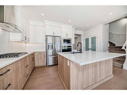 44 Carringvue Passage Nw, Calgary, AB - Indoor Photo Showing Kitchen With Upgraded Kitchen