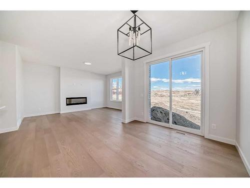 44 Carringvue Passage Nw, Calgary, AB - Indoor With Fireplace