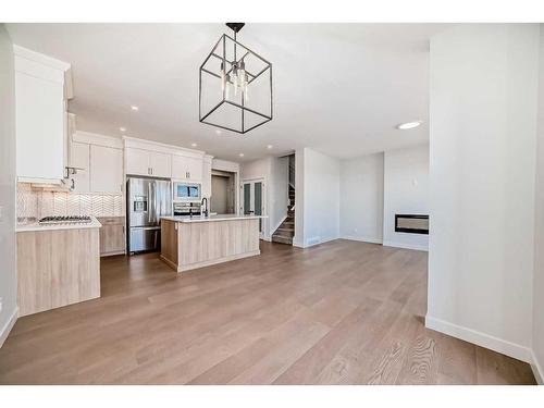 44 Carringvue Passage Nw, Calgary, AB - Indoor Photo Showing Kitchen With Upgraded Kitchen