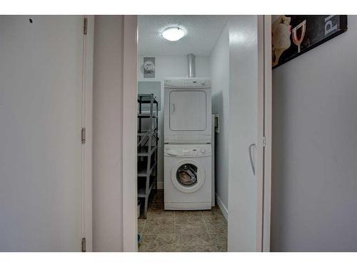 1804-8710 Horton Road Sw, Calgary, AB - Indoor Photo Showing Laundry Room