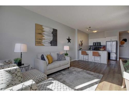 1804-8710 Horton Road Sw, Calgary, AB - Indoor Photo Showing Living Room