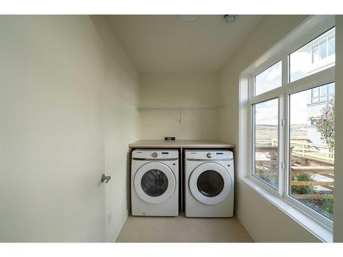 504-857 Belmont Drive Sw, Calgary, AB - Indoor Photo Showing Laundry Room