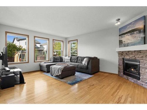 426 Tuscany Ridge Heights Nw, Calgary, AB - Indoor Photo Showing Living Room With Fireplace