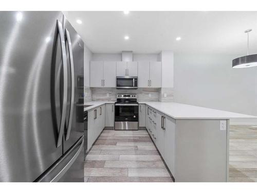 97 Corner Glen Way Ne, Calgary, AB - Indoor Photo Showing Kitchen With Stainless Steel Kitchen With Upgraded Kitchen