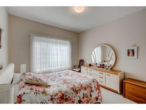 12 Brightondale Crescent Se, Calgary, AB - Indoor Photo Showing Bedroom