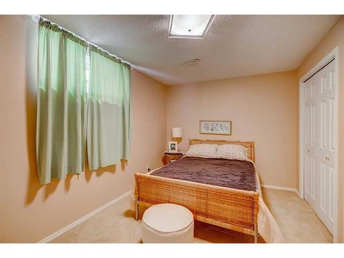 12 Brightondale Crescent Se, Calgary, AB - Indoor Photo Showing Bedroom