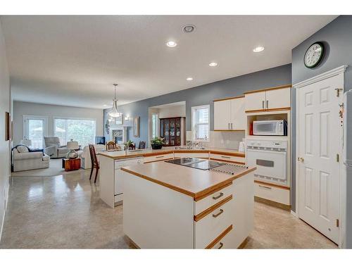 12 Brightondale Crescent Se, Calgary, AB - Indoor Photo Showing Kitchen With Double Sink