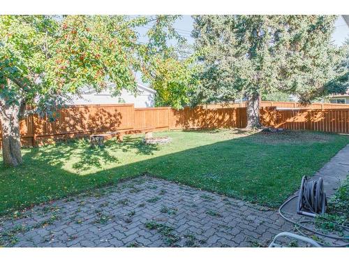 26 Butte Place Nw, Calgary, AB - Outdoor With Backyard