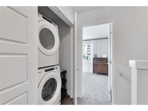 71 Evanscrest Common Nw, Calgary, AB - Indoor Photo Showing Laundry Room