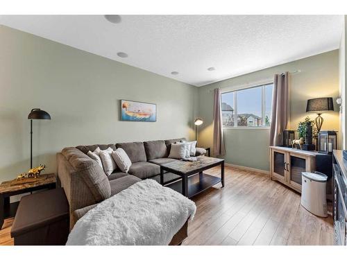 229 Copperpond Row Se, Calgary, AB - Indoor Photo Showing Living Room