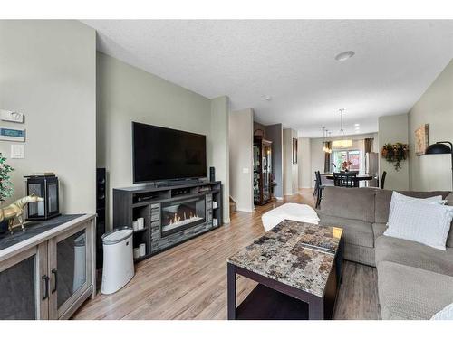 229 Copperpond Row Se, Calgary, AB - Indoor Photo Showing Living Room