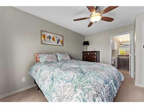 229 Copperpond Row Se, Calgary, AB - Indoor Photo Showing Bedroom