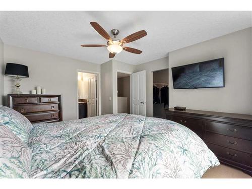 229 Copperpond Row Se, Calgary, AB - Indoor Photo Showing Bedroom