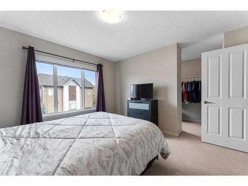 229 Copperpond Row Se, Calgary, AB - Indoor Photo Showing Bedroom