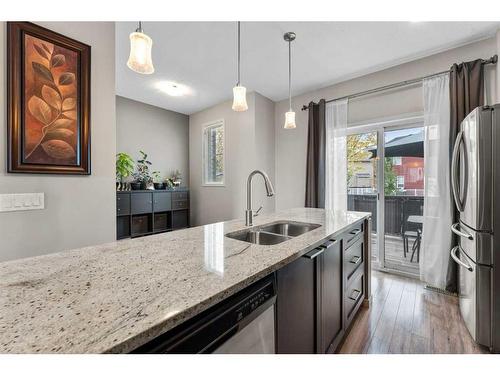 229 Copperpond Row Se, Calgary, AB - Indoor Photo Showing Kitchen With Stainless Steel Kitchen With Double Sink With Upgraded Kitchen