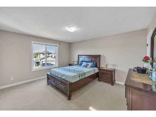 140 Saddlebrook Circle Ne, Calgary, AB - Indoor Photo Showing Bedroom