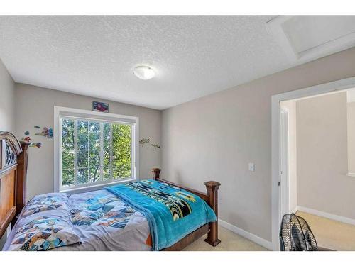 140 Saddlebrook Circle Ne, Calgary, AB - Indoor Photo Showing Bedroom