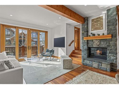 4-511 6Th Avenue, Canmore, AB - Indoor Photo Showing Living Room With Fireplace