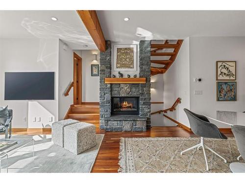 4-511 6Th Avenue, Canmore, AB - Indoor Photo Showing Living Room With Fireplace