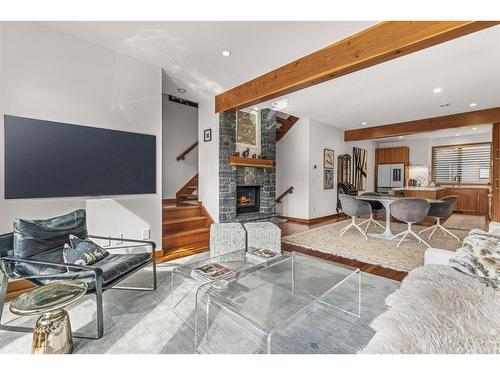 4-511 6Th Avenue, Canmore, AB - Indoor Photo Showing Living Room With Fireplace