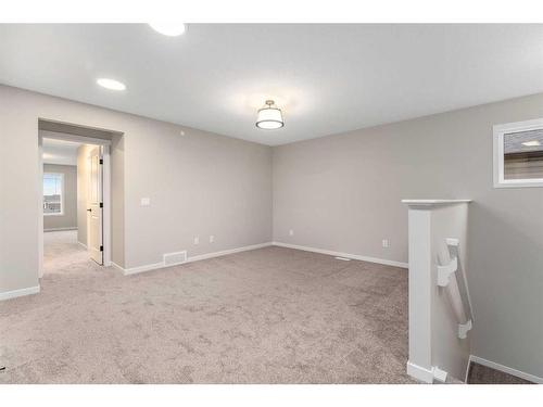 98 Hotchkiss Manor Se, Calgary, AB - Indoor Photo Showing Other Room