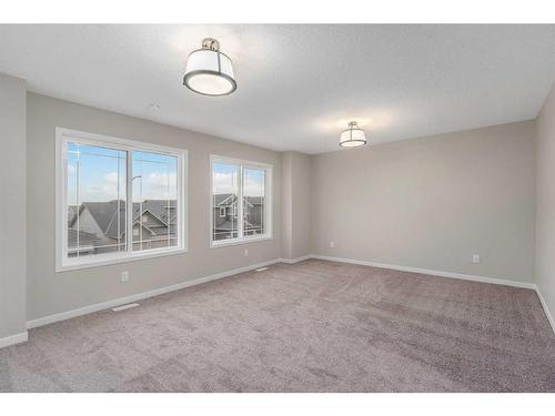 98 Hotchkiss Manor Se, Calgary, AB - Indoor Photo Showing Other Room