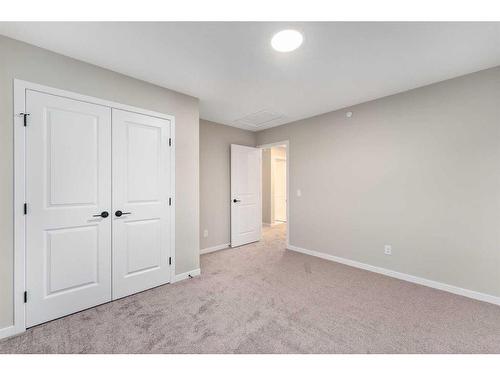 98 Hotchkiss Manor Se, Calgary, AB - Indoor Photo Showing Other Room