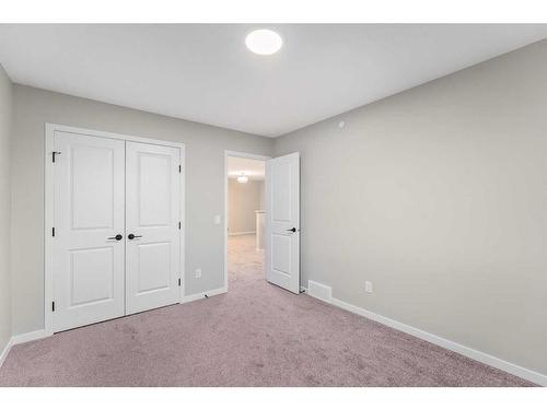 98 Hotchkiss Manor Se, Calgary, AB - Indoor Photo Showing Other Room