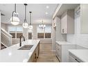 98 Hotchkiss Manor Se, Calgary, AB  - Indoor Photo Showing Kitchen 