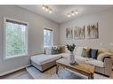 182 Mahogany Heights Se, Calgary, AB  - Indoor Photo Showing Living Room 