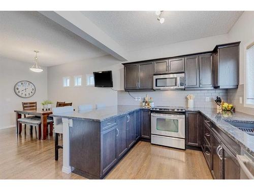 182 Mahogany Heights Se, Calgary, AB - Indoor Photo Showing Kitchen With Upgraded Kitchen