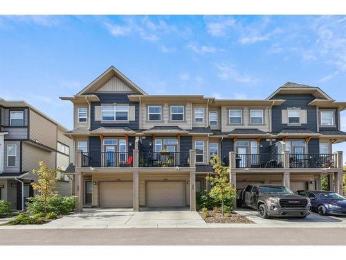 243 Legacy Common Se, Calgary, AB - Outdoor With Balcony With Facade