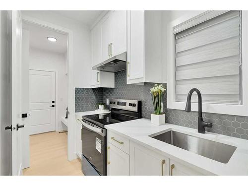 452 Legacy Boulevard Se, Calgary, AB - Indoor Photo Showing Kitchen With Upgraded Kitchen