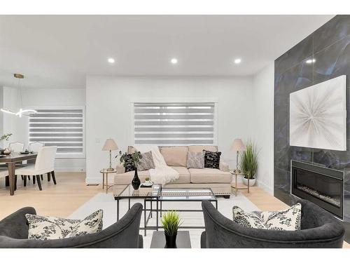 452 Legacy Boulevard Se, Calgary, AB - Indoor Photo Showing Living Room With Fireplace