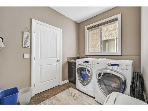 176 Sherwood Rise Nw, Calgary, AB - Indoor Photo Showing Laundry Room