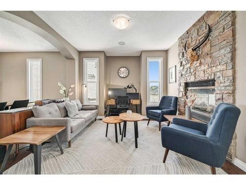 176 Sherwood Rise Nw, Calgary, AB - Indoor Photo Showing Living Room With Fireplace