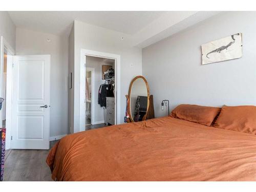 411-2300 Evanston Square Nw, Calgary, AB - Indoor Photo Showing Bedroom