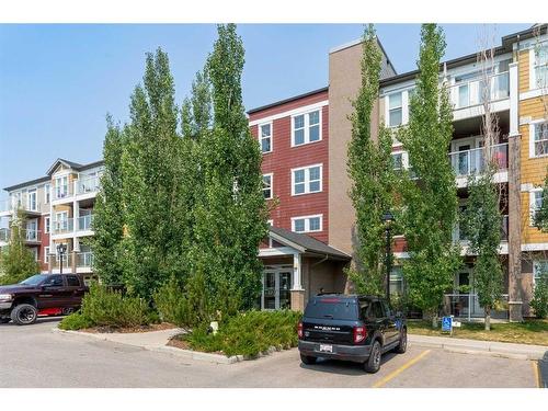 411-2300 Evanston Square Nw, Calgary, AB - Outdoor With Balcony With Facade